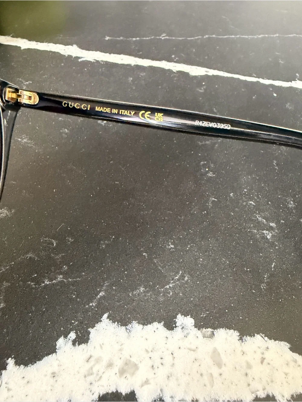 Gucci Black Frame Sunglasses with Gradient Purple Lenses